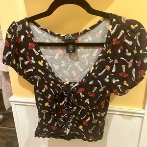 Thorn & Fable lace-up top with all over mushroom print. Purchased from Hot Topic